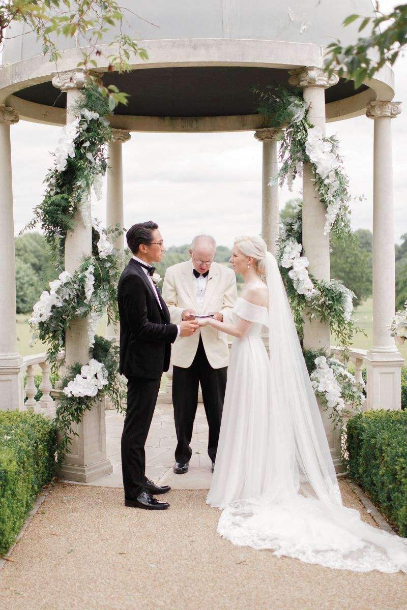 A British couple getting married at the outdoor dome at Froyle Park in Hampshire