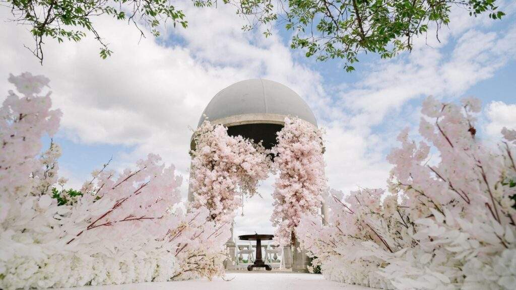 A fairytale outdoor wedding ceremony at Froyle Park - a heritage wedding venue on the Surrey / Hampshire border.