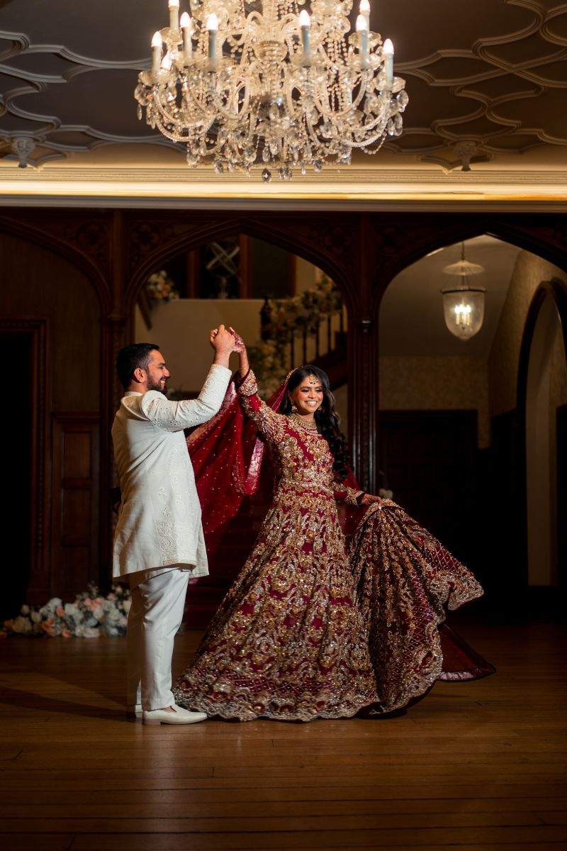 A Pakistani Bride & Groom share a moment in Froyle Park's historic Great Hall following their Nikkah ceremony.