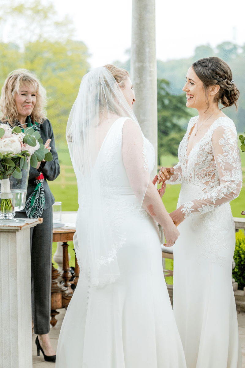 Two brides exchange their vows inside The Dome at Froyle Park