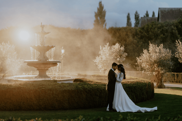 Froyle Park is an outdoor wedding venue in Surrey with beautiful grounds and ornate water fountains.