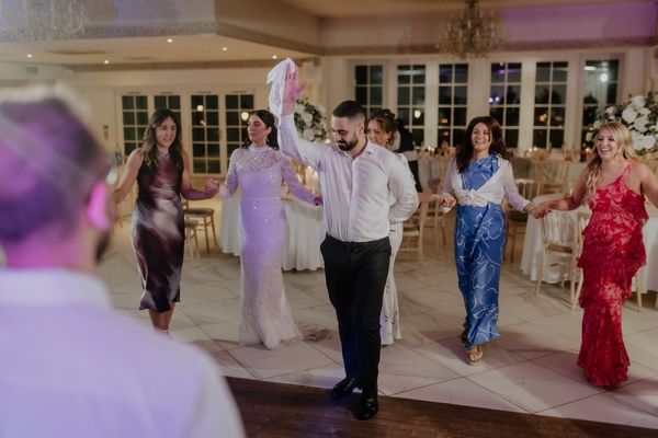 A Dabke line dance being enjoyed at a Lebanese wedding at Froyle Park in Hampshire