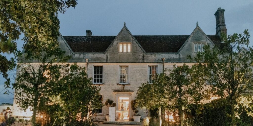 The Main House at Froyle Park at dusk